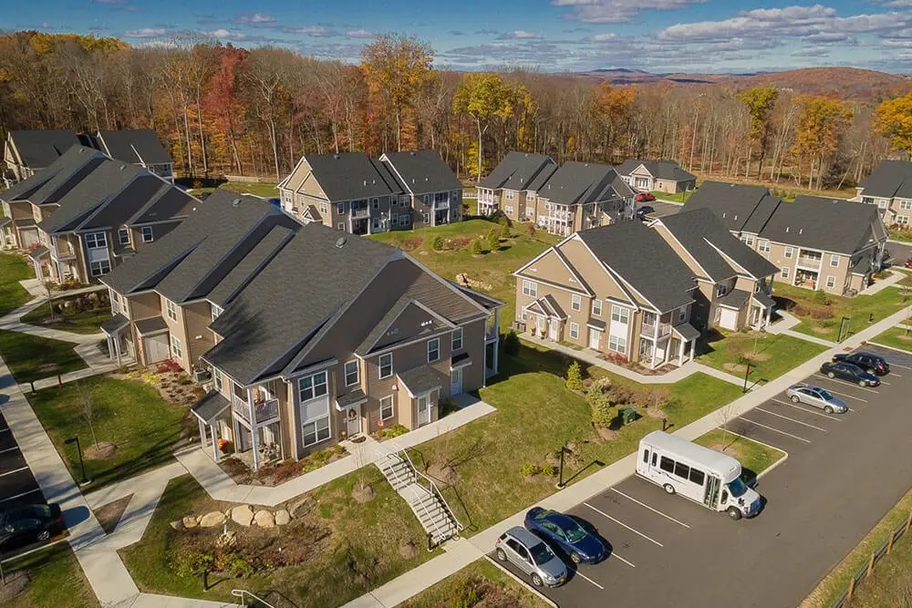 Aerial view across the Bridleside apartment buildings in autumn