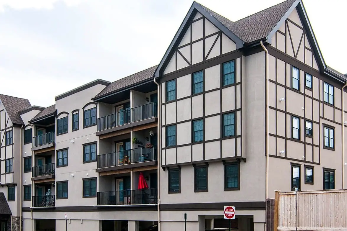 Tudor-style facade of the Pinebrook condominiums